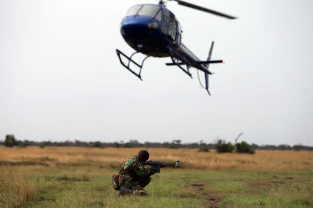 A special unit of wildlife rangers demonstrate an anti-poaching exercise ahead of the Giants Club Summit of African leaders and others on tackling poaching of elephants and rhinos, Ol Pejeta conservancy near the town of Nanyuki, Laikipia County, Kenya, April 28, 2016. REUTERS/Siegfried Modola