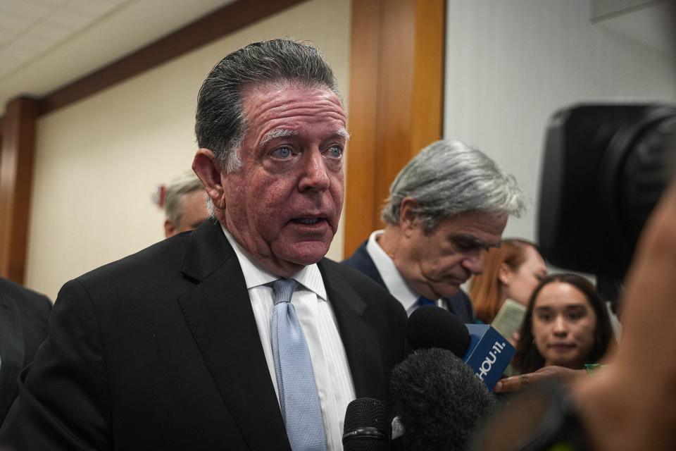 Dan Cogdell, a defense attorney in the 8-year-old securities fraud case against Texas Attorney General Ken Paxton, speaks to media outside the courtroom after a hearing at Harris County Criminal Justice Center on Thursday, Aug. 3, 2023 in Houston, Texas.