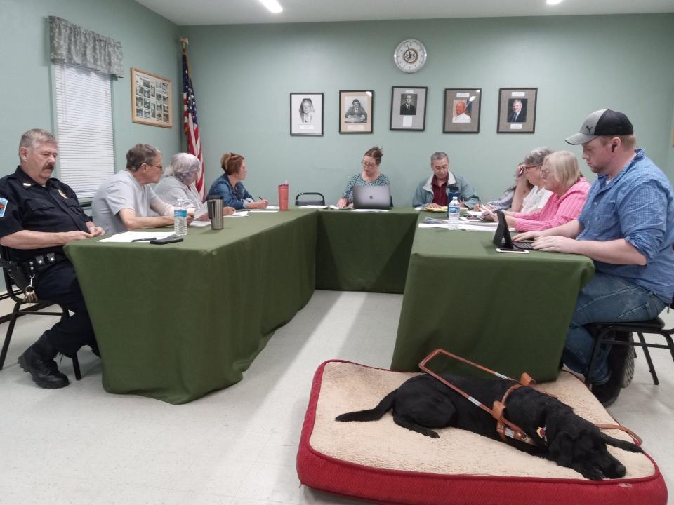 Hawley Borough officials, Sept. 13, 2023: From left, Chief Daniel Drake; Mayor John Nichols and council members Patricia Bartleson, Becky Mead, President Michele Rojas, Joseph Faubel, Ann Monaghan, Elaine Herzog and Michael Dougherty. Not clearly shown: Borough Secretary/Treasurer Andrea Racht. Pictures of some past councilors adorn the wall in back. Hawley became a borough in 1884.