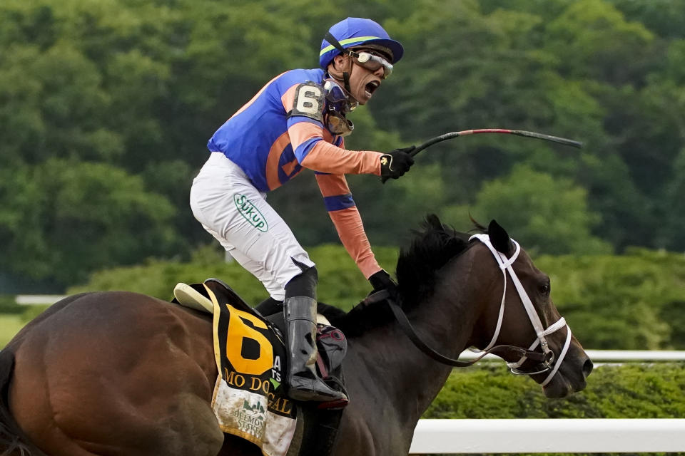 Jockey Irad Ortiz Jr. reacts after Mo Donegal (6) won the 154th running of the Belmont Stakes horse race, Saturday, June 11, 2022, at Belmont Park in Elmont, N.Y. (AP Photo/John Minchillo)