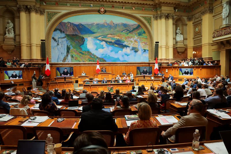 Ukraine's President Volodymyr Zelenskiy addresses Swiss Parliament via video message, in Bern