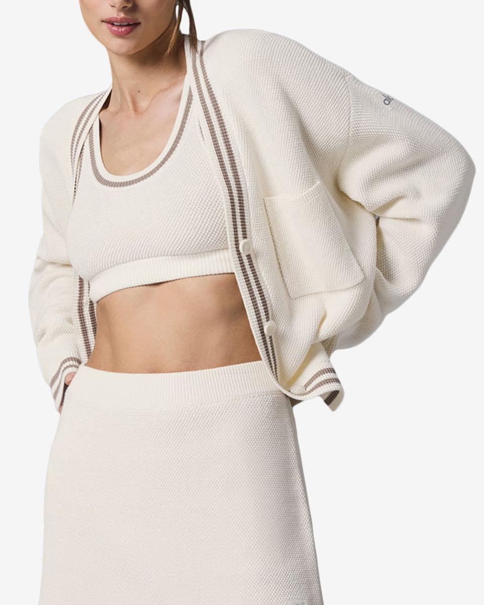 <p><a href="https://go.redirectingat.com?id=74968X1596630&url=https%3A%2F%2Fwww.aloyoga.com%2Fproducts%2Fw3847r-tennis-club-sweater-knit-cardigan-ivory-gravel&sref=https%3A%2F%2Fwww.elle.com%2Ffashion%2Fshopping%2Fa60581976%2Feditor-tenniscore-outfits%2F" rel="nofollow noopener" target="_blank" data-ylk="slk:Shop Now;elm:context_link;itc:0;sec:content-canvas" class="link ">Shop Now</a></p><p>Tennis Club Sweater Knit Cardigan </p><p>aloyoga.com</p><p>$168.00</p>