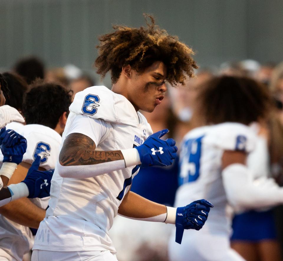 Chandler wide receiver Jaxon Branch shouts a chant prior to the game at the Mountain Ridge High School football stadium in Glendale on Aug. 31, 2023.