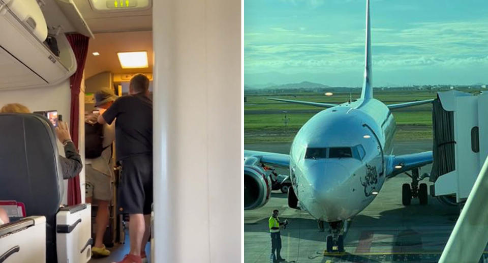 A photo of an unruly passenger having to be restrained by staff and a passenger on a Virgin Townsville to Sydney flight on Wednesday.