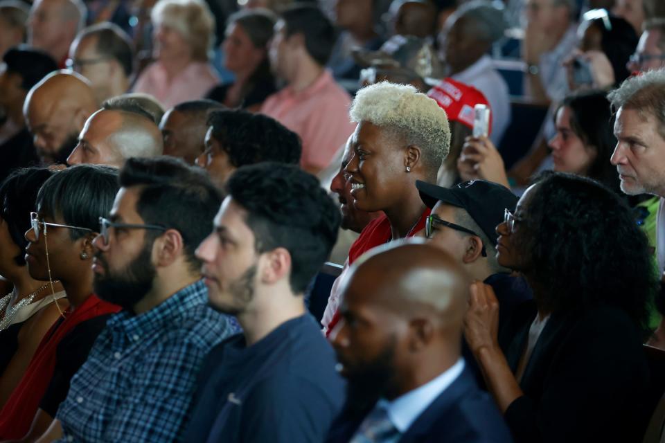 (Middle) Celeste Mentag, 48 of Detroit, listens with many others inside 180 Church during a round table discussion with former President Donald Trump in Detroit on Saturday, June 15, 2024.
"I believe he is the appropriate candidate for the times we're in," Mentag said.