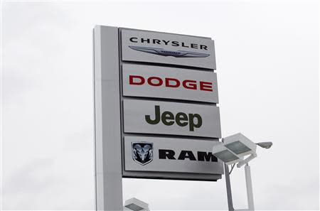 Chrysler, Dodge, Jeep and Ram signage is displayed outside Bill Snethkamp dealership in Detroit, Michigan January 2, 2014. REUTERS/Joshua Lott