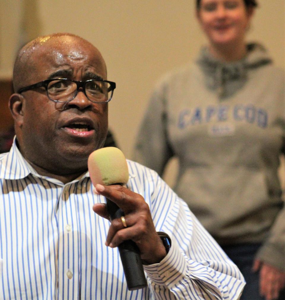 Samuel Cook, associate professor of voice and artist in residence at Abilene Christian University, sings with the ACU Gospel Choir during rehearsal Monday evening at Macedonia Baptist Church. The group will perform there at 7:30 p.m. Wednesday, a presentation open to the public.