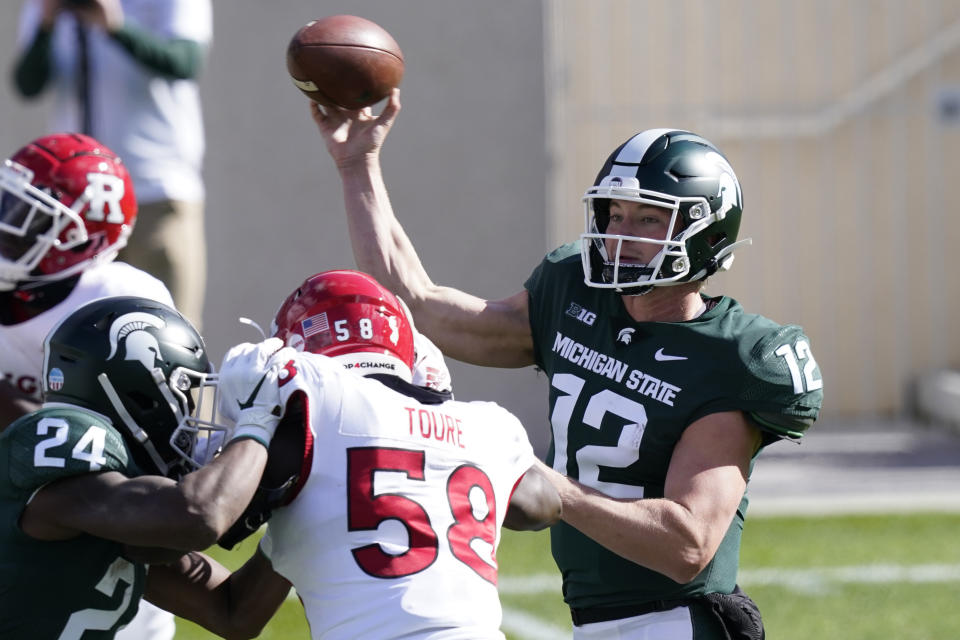 Michigan State quarterback Rocky Lombardi throws during the first half of an NCAA college football game against Rutgers, Saturday, Oct. 24, 2020, in East Lansing, Mich. (AP Photo/Carlos Osorio)