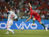 <p>Airborne: Portugal’s Goncalo Guedes shoots against Spain’s Sergio Ramos. (AP) </p>