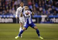 Football Soccer- Spanish La Liga Santander - Deportivo v Real Madrid - Riazor stadium, A Coruna, Spain - 26/04/17 Deportivo's Florin Andone (R) and Real Madrid's Raphael Varane in action. REUTERS/Miguel Vidal