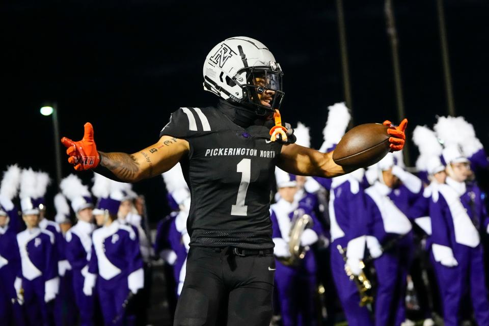 Pickerington North wide receiver Preston Bowman (1) celebrates a touchdown catch during the Panthers' 39-34 win over Pickerington Central on Friday night.