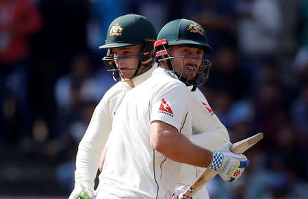 India v Australia - Third Test cricket match - Jharkhand State Cricket Association Stadium, Ranchi, India - 20/03/17 - Australia's Peter Handscomb and Shaun Marsh (R) run between the wickets. REUTERS/Adnan Abidi