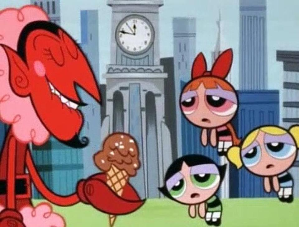 HIM enjoys an ice cream cone in front of a clock tower, while the Powerpuff Girls look on wearily.