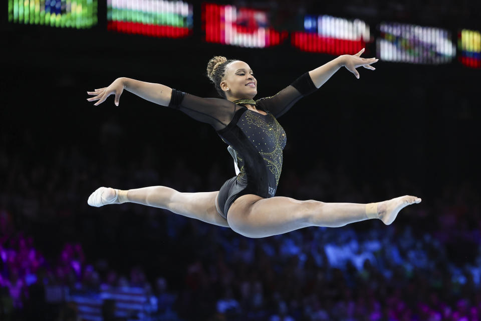 Brazil's Rebeca Andrade competes on the floor during the women's team final at the Artistic Gymnastics World Championships in Antwerp, Belgium, Wednesday, Oct. 4, 2023. (AP Photo/Geert vanden Wijngaert)