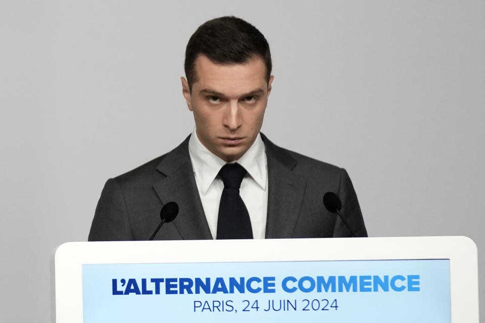 Far-right National Rally party president Jordan Bardella gives a press conference, Monday, June 24, 2024 in Paris. The upcoming two-round parliamentary election will take place on June 30 and July 7. (AP Photo/Christophe Ena)