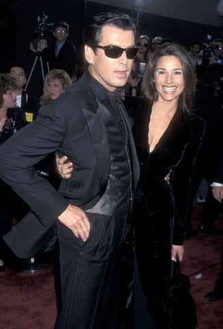 <p>Ron Galella, Ltd./Ron Galella Collection via Getty</p> Pierce Brosnan and Keely Shaye Smith in 1996