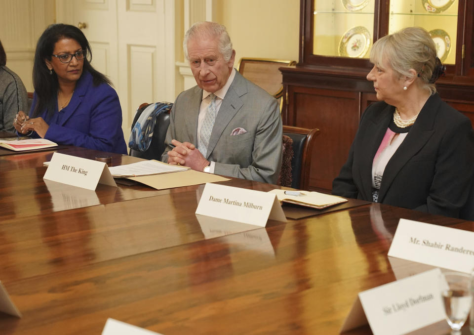 Britain's King Charles III, centre, speaks during an audience in the Billiard Room at Buckingham Palace, London, on Tuesday March 26, 2024 with community faith leaders from across the UK who have taken part in a Windsor Leadership Trust programme, encouraging and supporting dialogue, harmony and understanding at a time of heightened international tension. (Jonathan Brady, Pool Photo via AP)