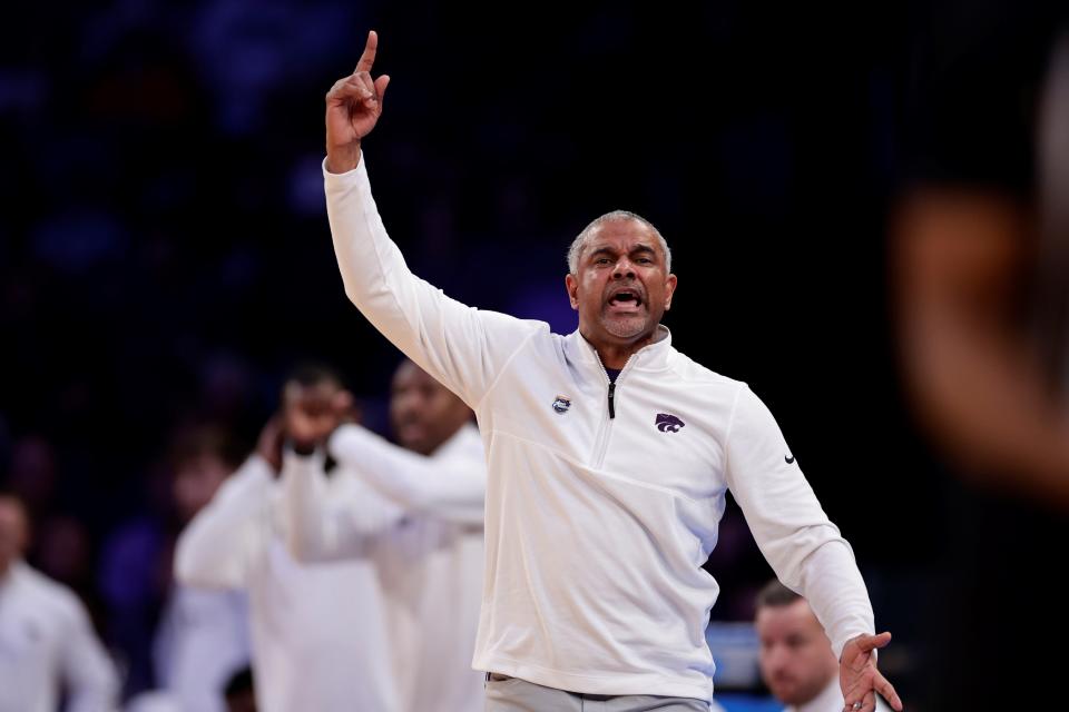 Kansas State head coach Jerome Tang signals in the second half of a Sweet 16 college basketball game against Michigan State in the East Regional of the NCAA tournament at Madison Square Garden, Thursday, March 23, 2023, in New York. (AP Photo/Adam Hunger)