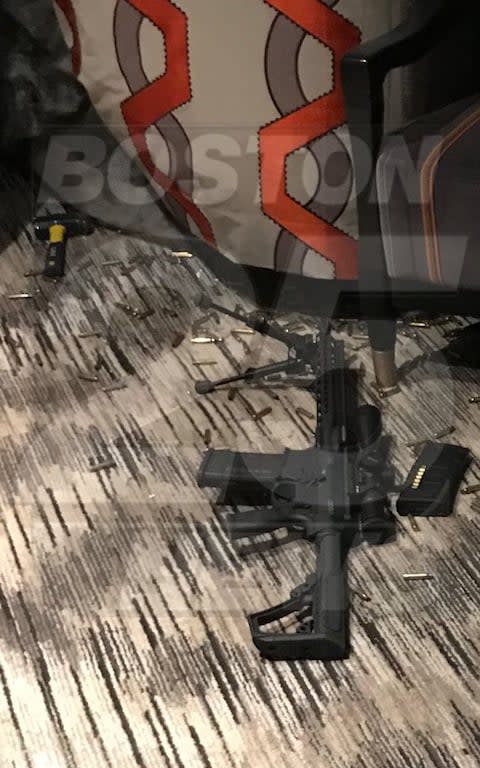 A photo from inside the hotel room where Paddock launched his attack, showing one of the weapons apparently used - Credit: Boston25 News