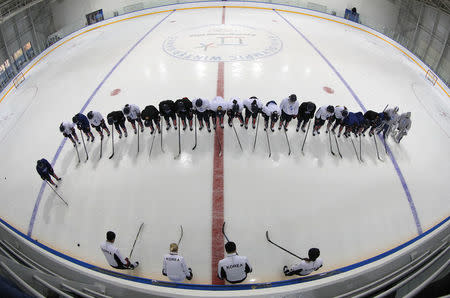 Ice Hockey – Pyeongchang 2018 Winter Olympics – Women's Training - Kwandong Hockey Centre, Gangneung, South Korea – February 9, 2018 - Korea team bows during training. REUTERS/Brian Snyder TPX IMAGES OF THE DAY