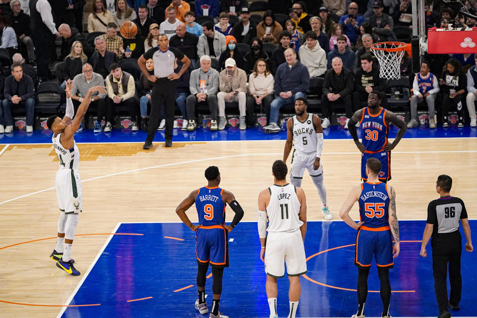 Milwaukee Bucks forward Giannis Antetokounmpo shoots a free throw during the first half of an NBA basketball game against the New York Knicks in New York, Saturday, Dec. 23, 2023. (AP Photo/Peter K. Afriyie)