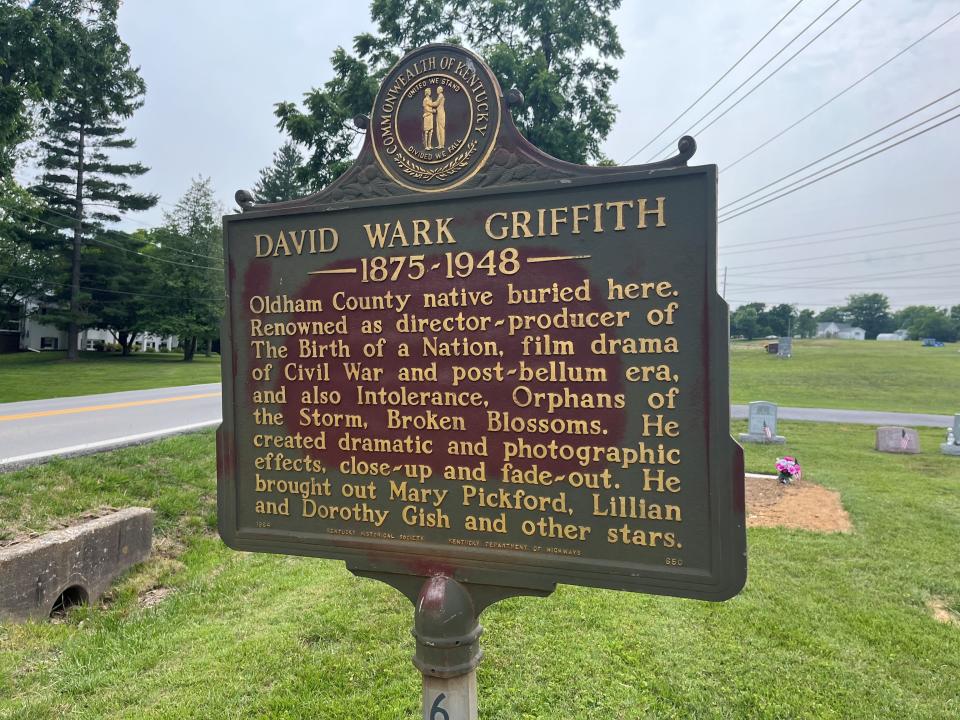 A state historical marker honoring noted movie director and racist, D.W. Griffith.