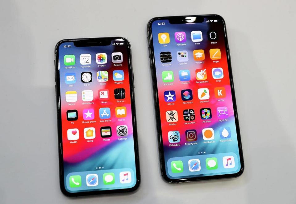 The new Apple iPhone Xs (L) and iPhone Xs Max (R) are displayed during an Apple special event at the Steve Jobs Theatre on September 12, 2018 in Cupertino, California (Justin Sullivan/Getty Images)