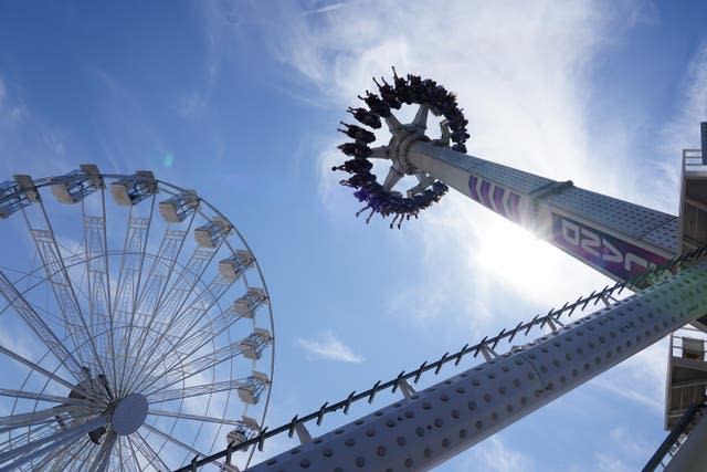 People on the Axis ride at Adventure Island in Southend-on-Sea as the heatwave continues in the UK