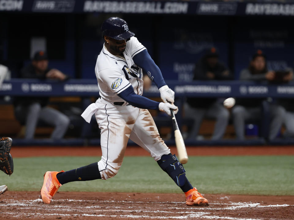 Tampa Bay Rays' Yandy Diaz hits a two-run double against the Detroit Tigers during the third inning of a baseball game Saturday, April 1, 2023, in St. Petersburg, Fla. (AP Photo/Scott Audette)
