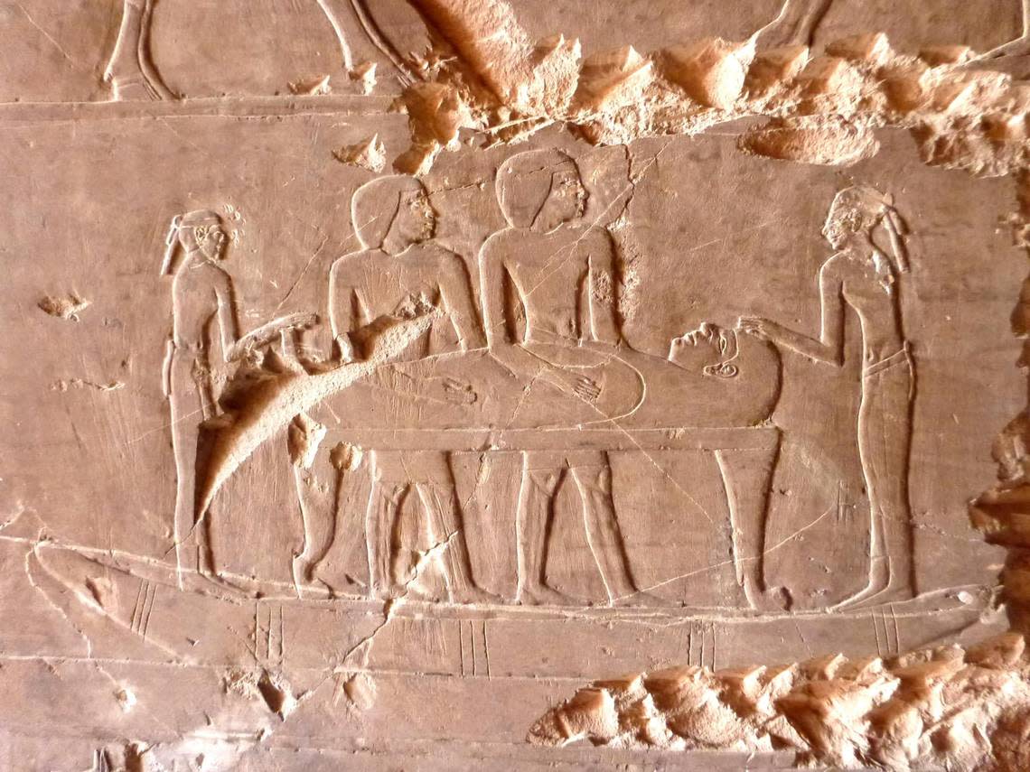 A carving showing Hery’s coffin crossing the Nile River on a boat.