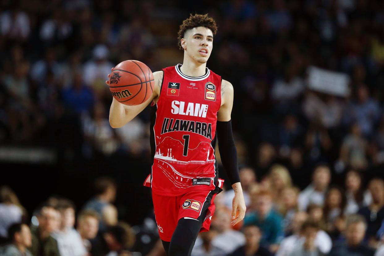 Will an injury and concerns attached to his father LaVar impact LaMelo Ball's draft status? (Photo by Anthony Au-Yeung/Getty Images)