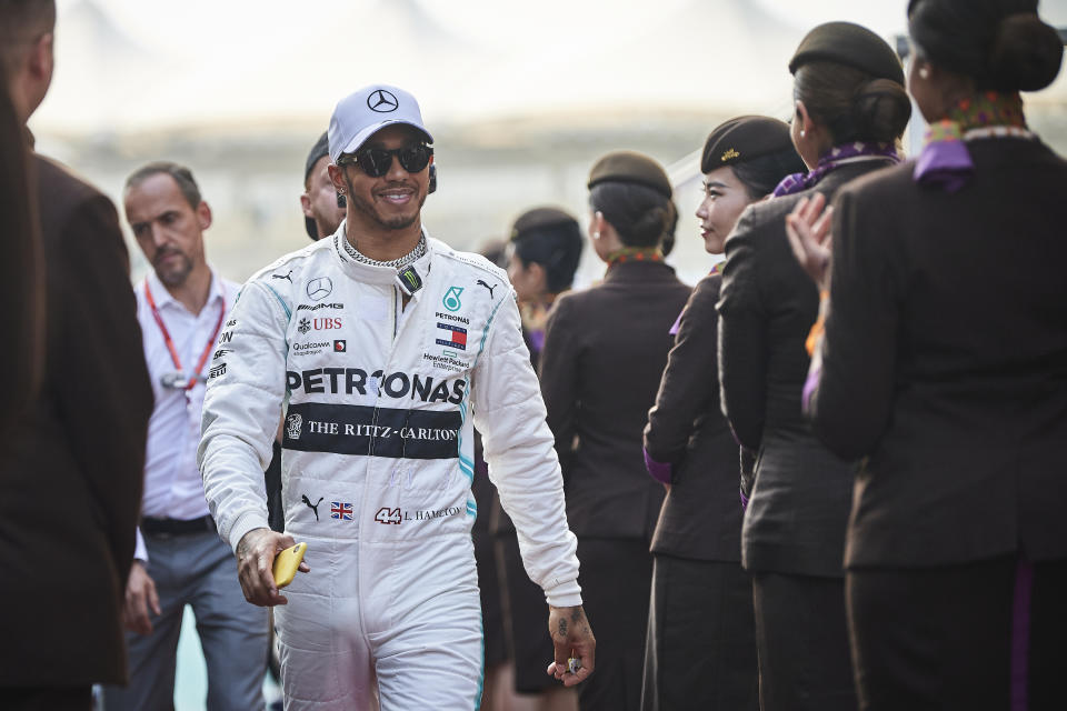 ABU DHABI, UNITED ARAB EMIRATES - 2019/12/01: Mercedes AMG Petronas F1 Teams British driver Lewis Hamilton arrives for the drivers parade ahead of the Abu Dhabi F1 Grand Prix race at the Yas Marina Circuit in Abu Dhabi. (Photo by Jure Makovec/SOPA Images/LightRocket via Getty Images)