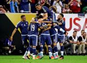 Jun 21, 2016; Houston, TX, USA; Argentina midfielder Lionel Messi (10) celebrates with teammates after scoring a goal during the first half against the United States in the semifinals of the 2016 Copa America Centenario soccer tournament at NRG Stadium. Mandatory Credit: Kevin Jairaj-USA TODAY Sports