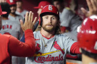 St. Louis Cardinals' Brendan Donovan celebrates his sacrifice fly against the Arizona Diamondbacks during the second inning of a baseball game Friday, April 12, 2024, in Phoenix. (AP Photo/Ross D. Franklin)