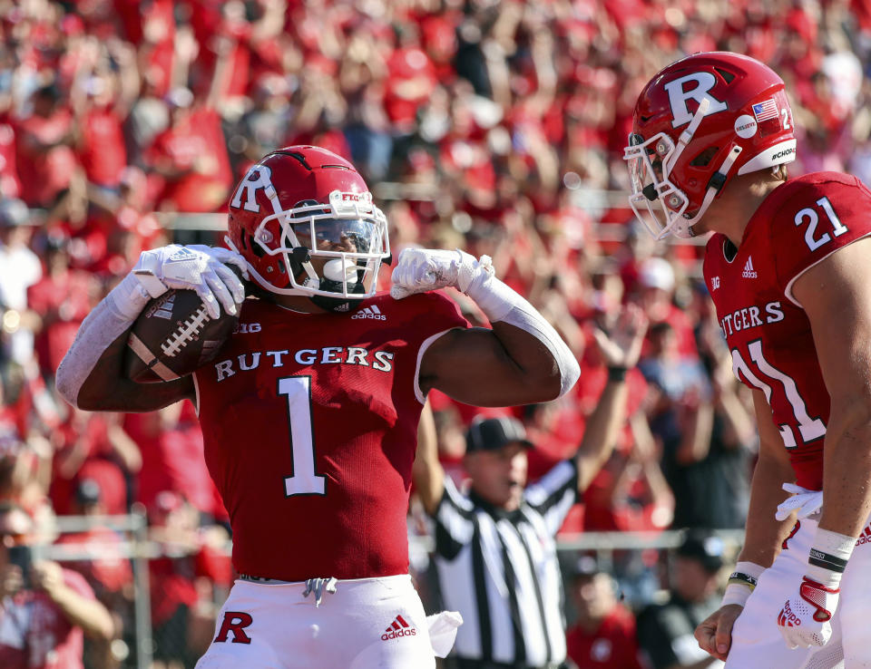 Rutgers running back Isaih Pacheco (1) reacts after he rushed for a 20-yard touchdown during the first half of an NCAA college football game against Delaware, Saturday, Sept. 18, 2021, in Piscataway, N.J. (Andrew Mills/NJ Advance Media via AP)