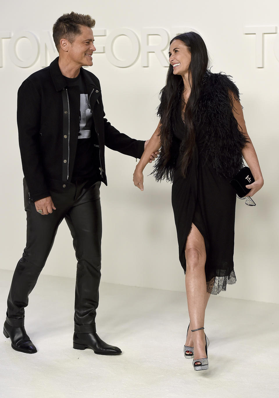 Rob Lowe and Demi Moore attend the Tom Ford show at Milk Studios during NYFW Fall/Winter 2020 on Friday, Feb. 7, 2020, in Los Angeles. (Photo by Jordan Strauss/Invision/AP)