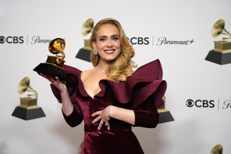 FILE - Adele, winner of the award for best pop solo performance for "Easy on Me," poses in the press room at the 65th annual Grammy Awards on Sunday, Feb. 5, 2023, in Los Angeles. Adele turns 35 on May 5. (AP Photo/Jae C. Hong, File)