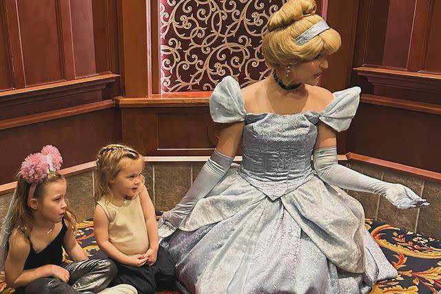<p>Hilary Duff Instagram</p> Banks and Mae with Cinderella at Disneyworld in an Instagram post on Dec.14, 2023