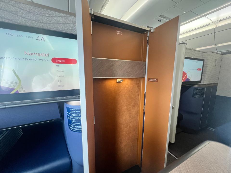 An open closet in a business class suite on board an Air India Airbus A350 at the 2024 Farnborough Airshow