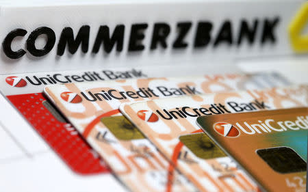 A 3-D printed Commerzbank logo is seen near Unicredit credit cards in this illustration taken September 20, 2017. REUTERS/Dado Ruvic/Illustration