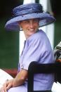 <p>Wearing a purple-and-black netted Philip Somerville hat white attending a ceremony in Green Park, London. </p>