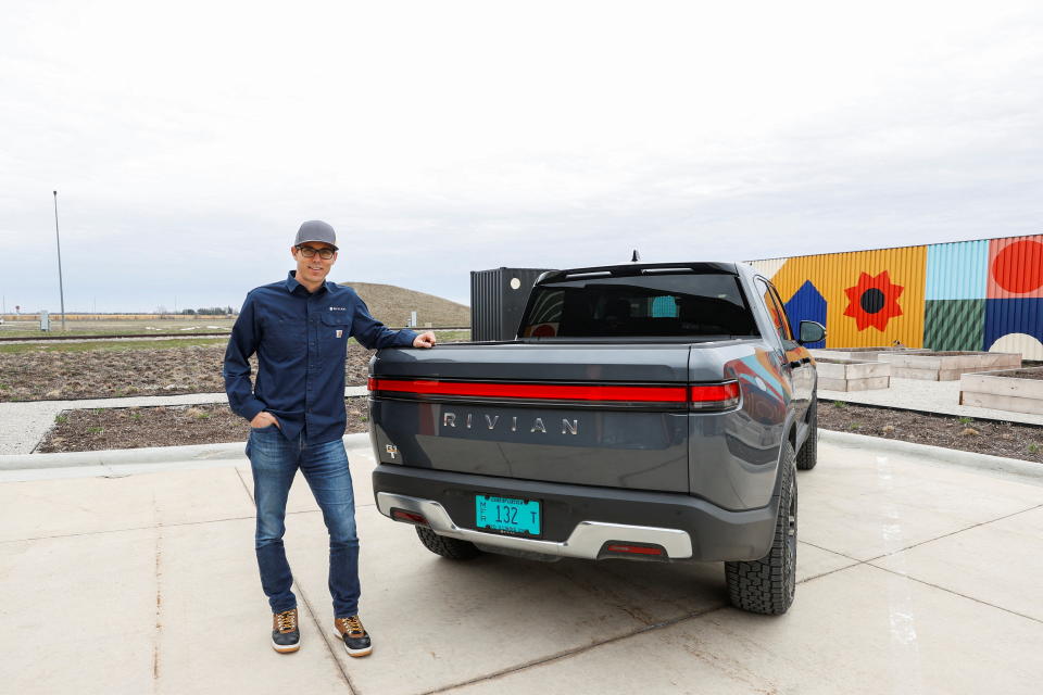 CEO RJ Scaringe stands outside the startup Rivian Automotive's electric vehicle factory in Normal, Illinois, U.S. April 11, 2022. Picture taken April 11, 2022.  REUTERS/Kamil Krzaczynski