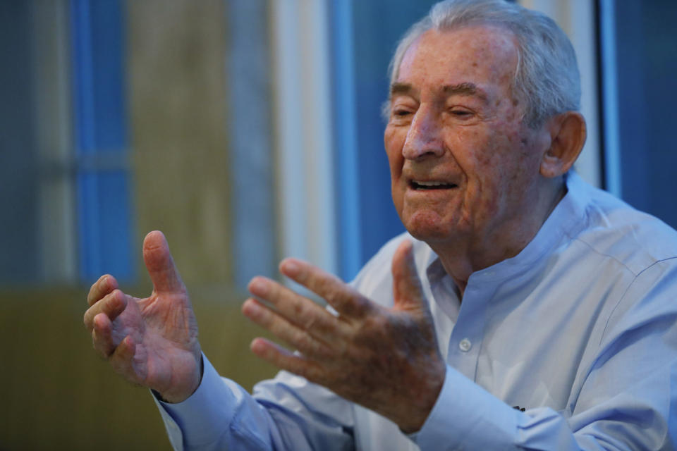 In this, Monday, Oct. 7, 2019 photo, David Schaecter, president of the Holocaust Survivors Foundation USA (HSF), gestures as he speaks during an interview with The Associated Press in Aventura, Fla. Aging Holocaust survivors are trying to recover insurance benefits that were never honored by Nazi-era companies, which could be worth billions of dollars. The companies have demanded original paperwork, such as death certificates, that were not available after World War II. The survivors want to take insurance companies to court in the U.S. to recover the money, but it would take an act of Congress to allow it. (AP Photo/Wilfredo Lee)