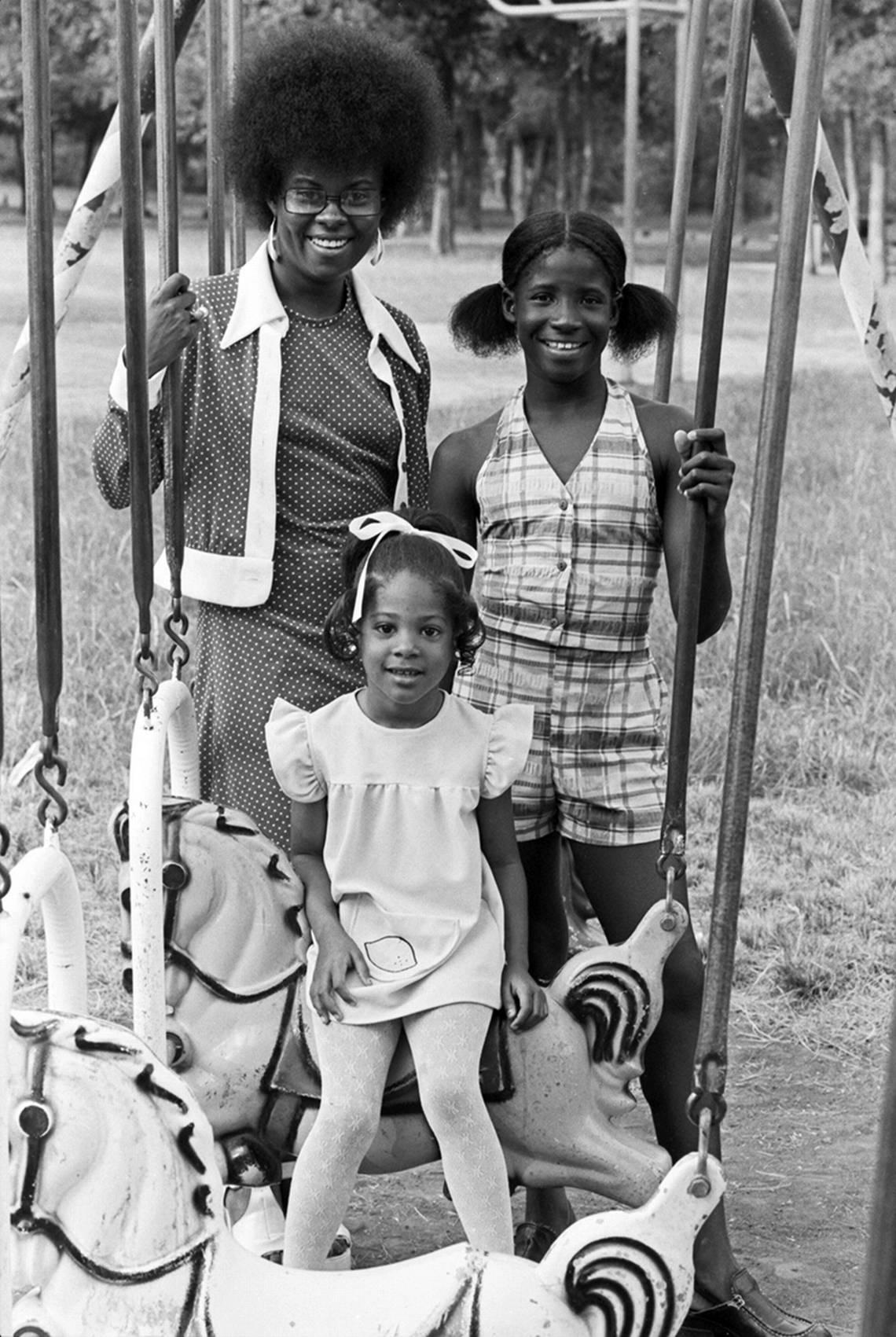 In 1974, Mona Thomas, left, Yolanda Lyons, right, and Tanja Broadus are three of the 30 contestants who have entered the Miss Juneteenth contest in Sycamore Park in Fort Worth.