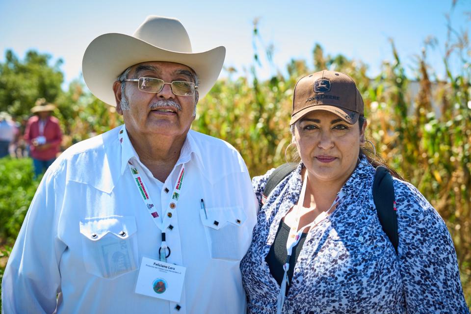Feliciano Lara and Reyna Lara pose for a portrait during the 25th International Pepper Conference at Curry Farms in Pearce, Arizona on Tuesday, Sept. 27, 2022.