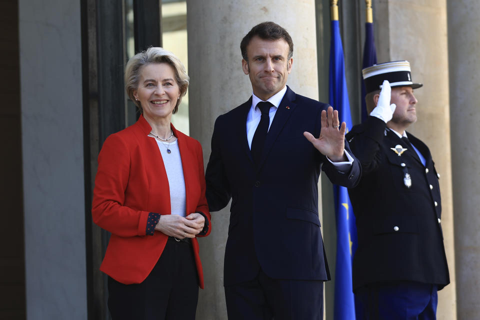 European Commission president Ursula van der Leyen smiles as she is welcomed by French President Emmanuel Macron before a working lunch, Monday, April 3, 2023 at the Elysee Palace in Paris. The two leaders will travel to China later this week. (AP Photo/Aurelien Morissard)