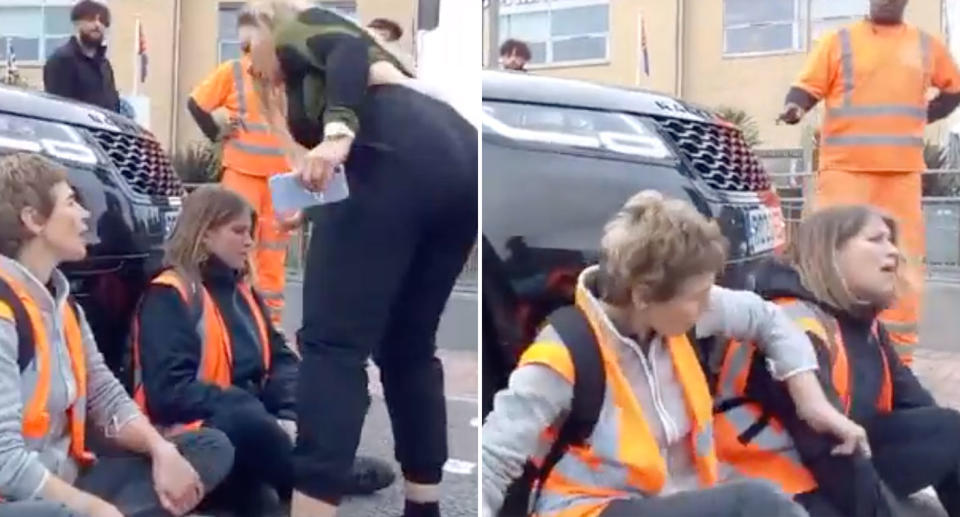 A woman nudged her car into protesters sitting on the road in England. Source: Insulate Britain
