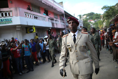 Members of the Haitian Armed Forces (FAD'H) parade in the streets of Cap-Haitien, Haiti, November 18, 2017. REUTERS/Andres Martinez Casares