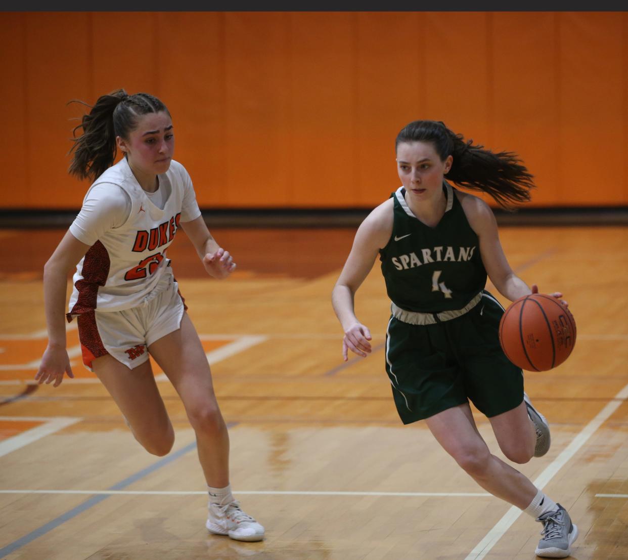 Spackenkill's Blythe McQuade drives up court against Marlboro during a Feb. 16, 2023 girls basketball game.