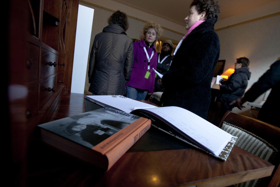 FILE - In this Saturday Dec. 10, 2011 file photo Anne Frank's diary is seen on her writing desk as visitors tour the first house of Anne Frank in Amsterdam, Netherlands, where the Frank family lived from 1933 to 1942 before going into hiding into The Secret Annex. Two nonprofit organizations, The Anne Frank Fund, based in Basel, Switzerland and The Anne Frank Foundation, which manages the museum located in Amsterdam, are locked in a dispute over the Frank family archives, which have been kept in Amsterdam since 2007. Foundation spokeswoman Maatje Mostart said Wednesday May 8, 2013 of the fight “it's really sad this is happening." (AP Photo/Peter Dejong, File)
